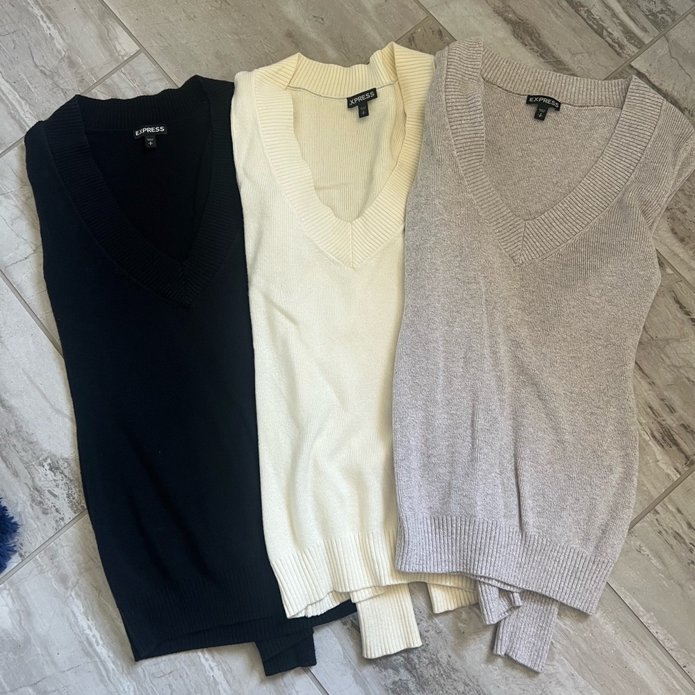 3 Woman’s long sleeve Express sweaters